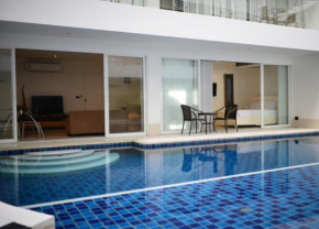  Sunset Plaza Condominium  Карон